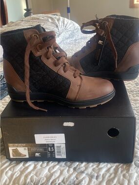 Sorel Brown and Black  womens ankle boot 
Brand new with tags